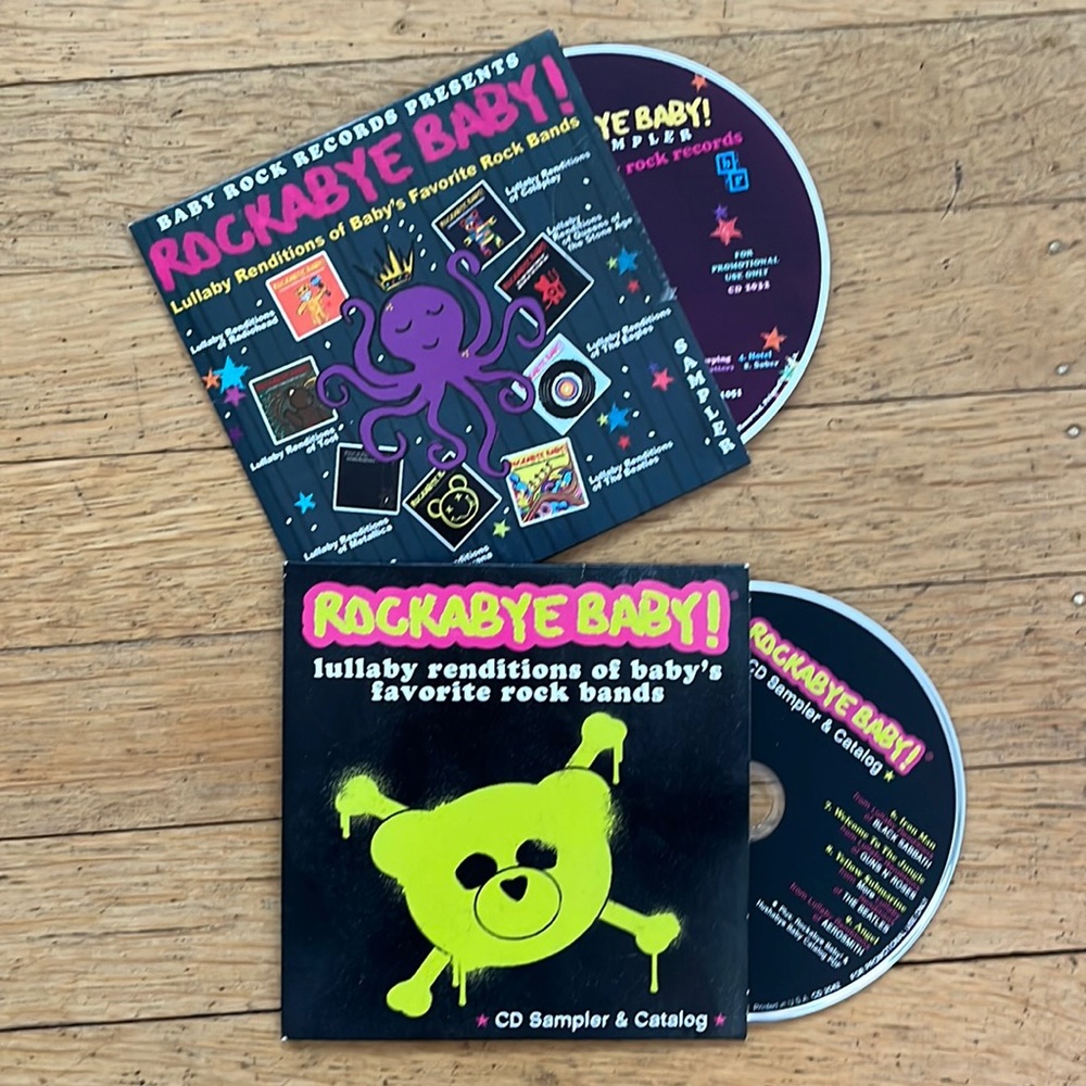 Rockabye Baby CD sampler lot of two, Journey Queen Kanye Elvis Nirvana Beatles